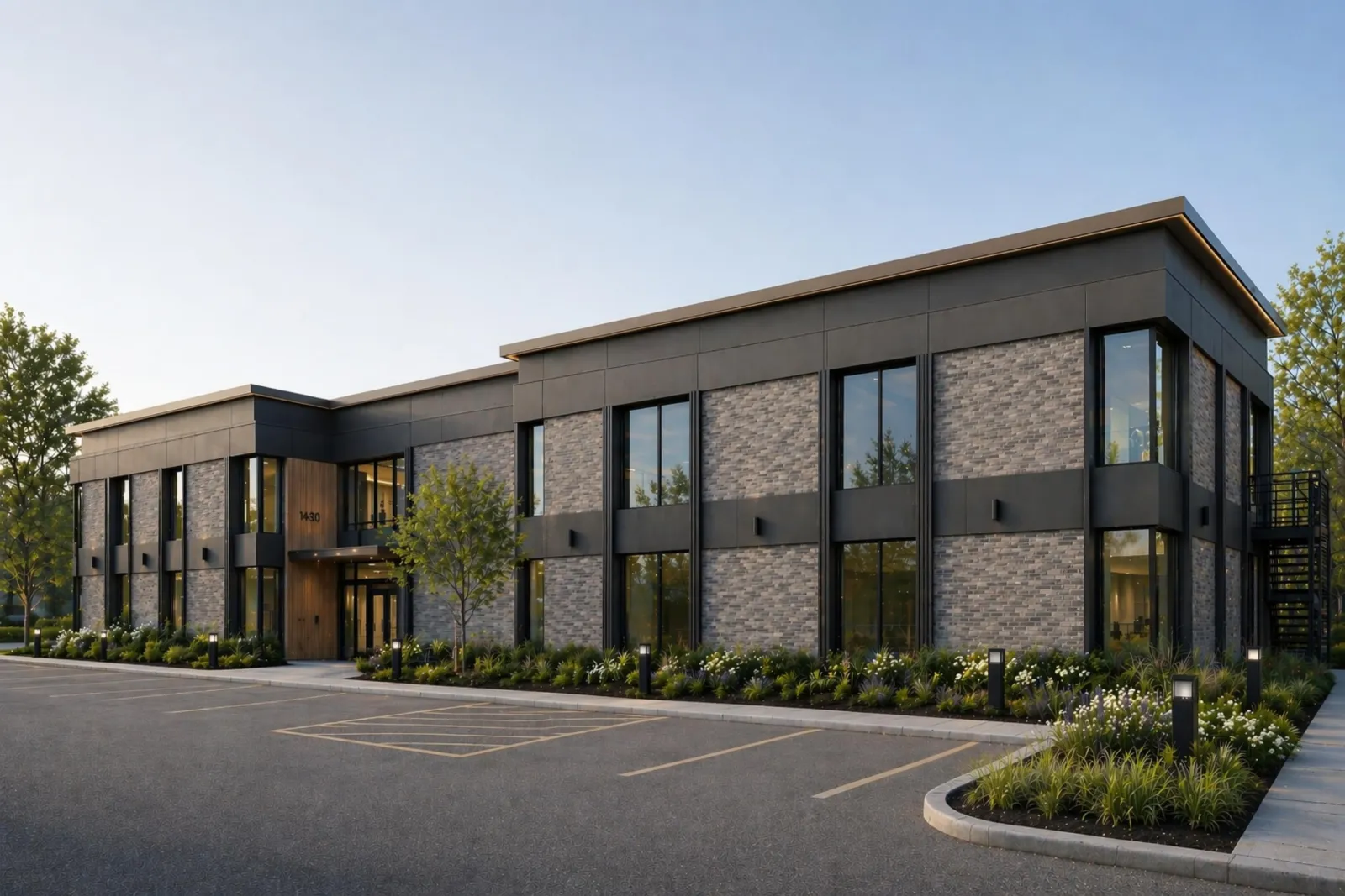 Updated rendering of the Willowbrook office building with modern facade and landscaping